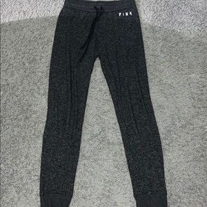 Pink black/grey joggers.